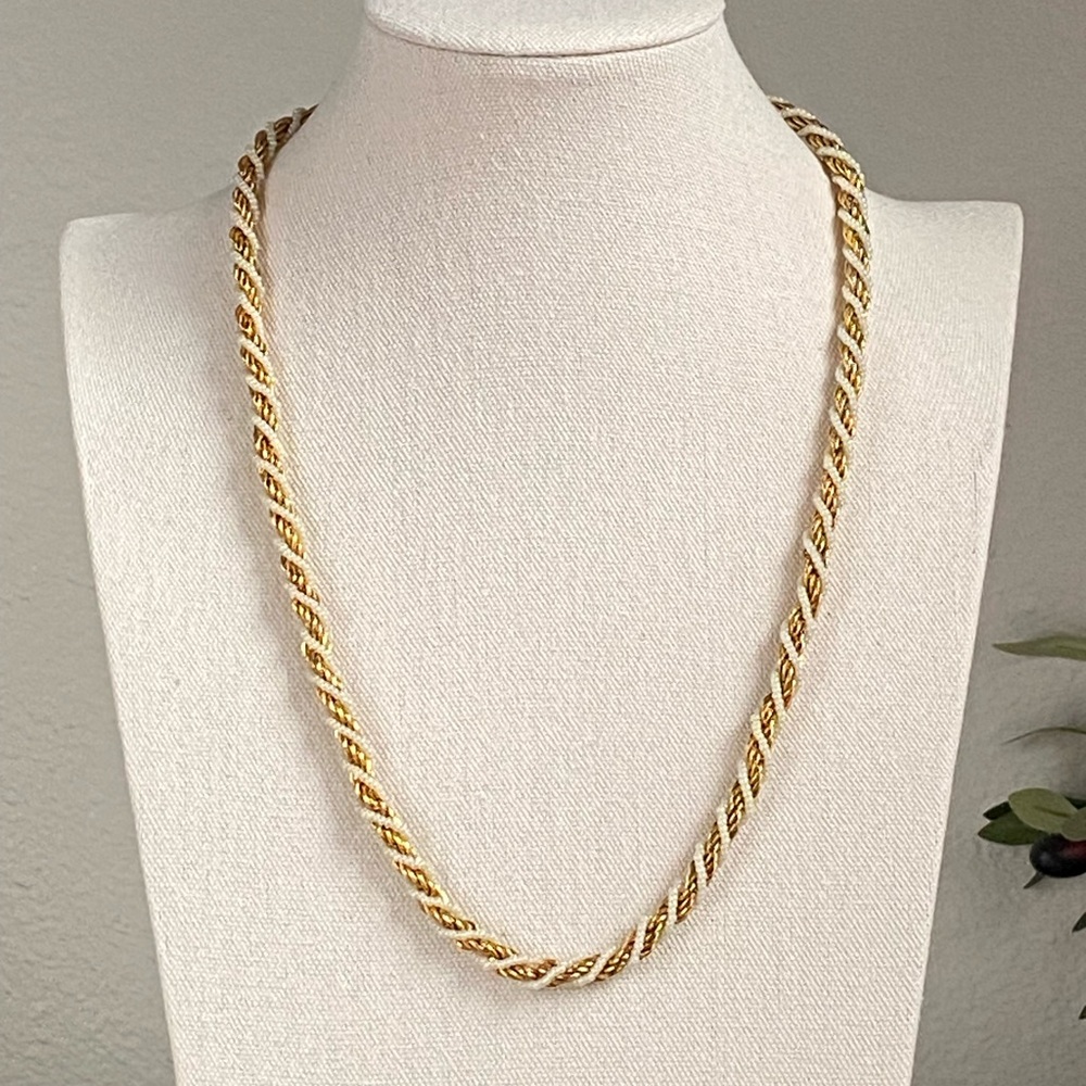 Elegant Twisted Gold and Silver Necklace
